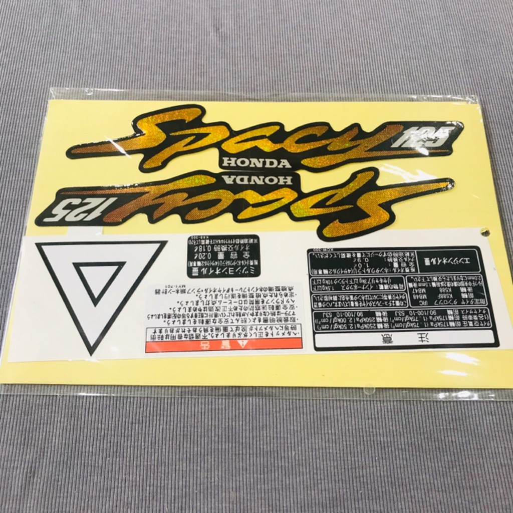 Nguyên bộ tem thông số và chữ dán xe máy Spacy 125 vàng lấp lánh