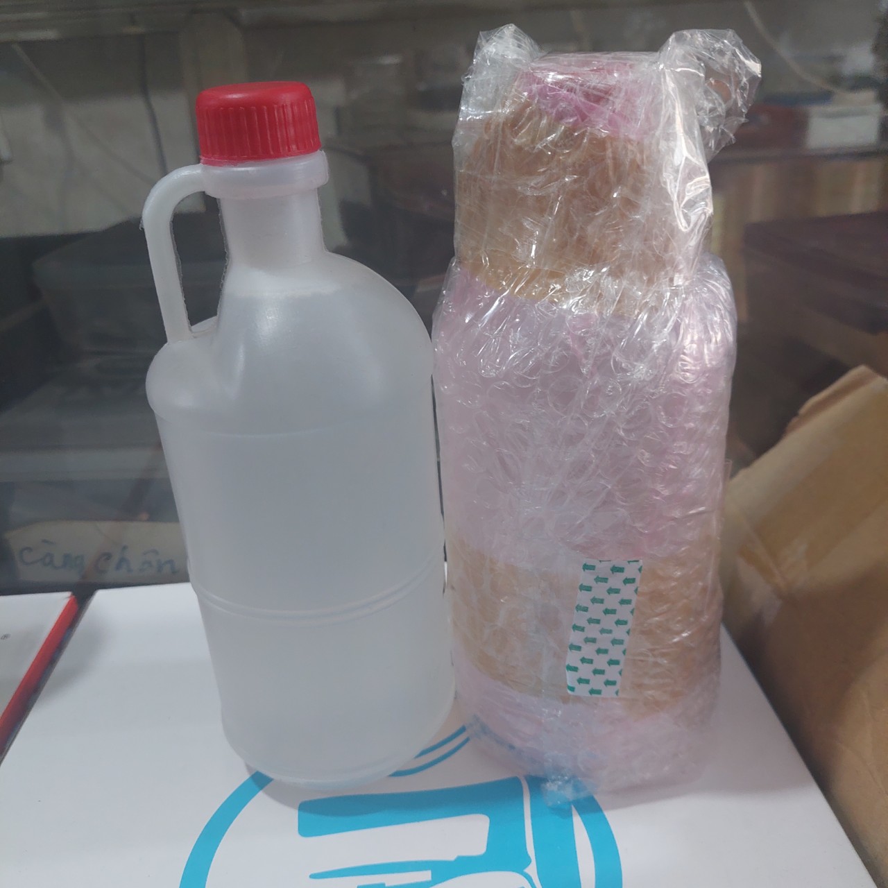 chai dầu 1 lít máy may công nghiệp