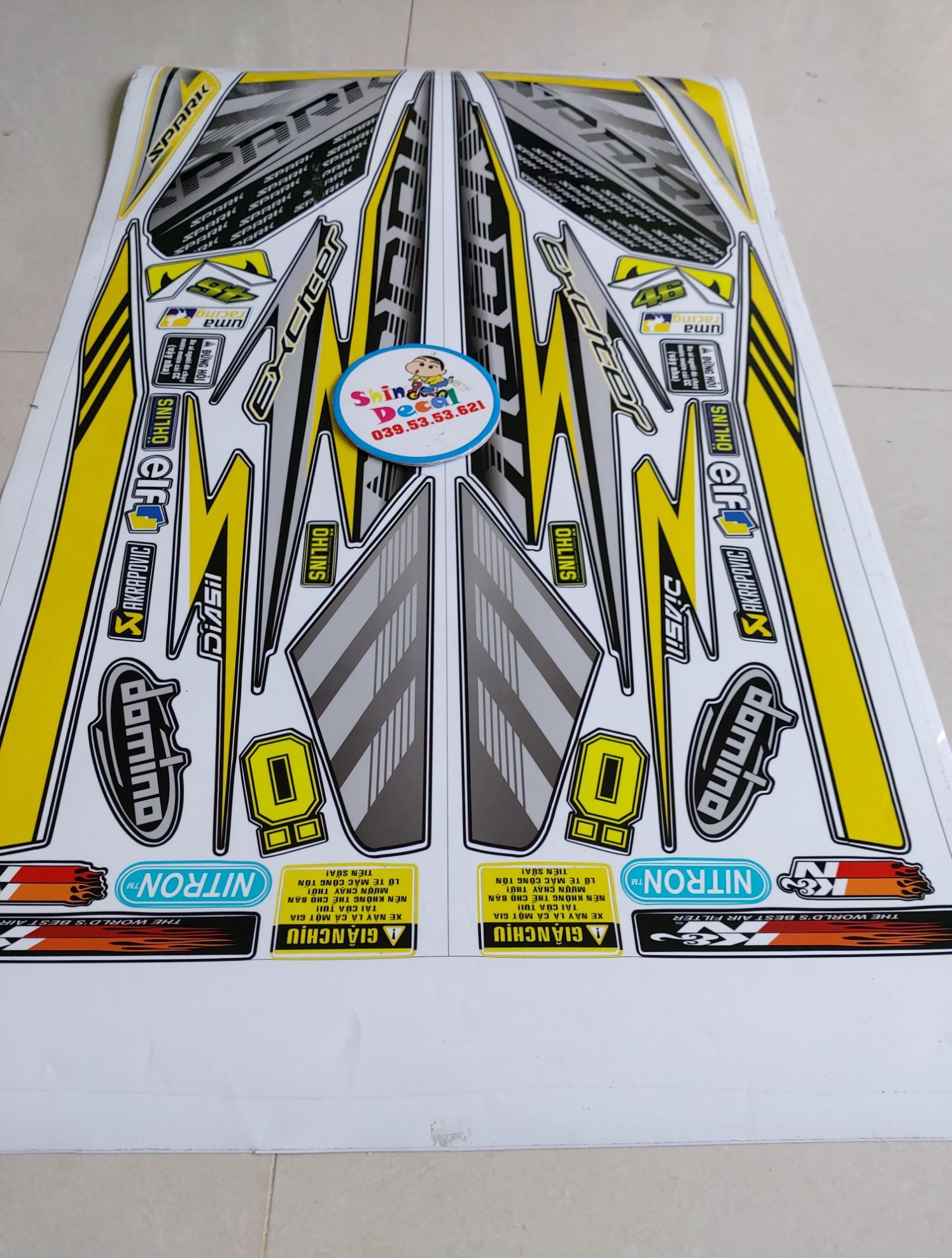Tem exciter 2010 spark vàng đen
