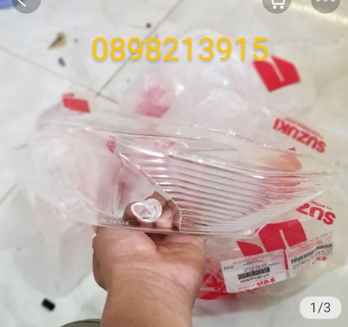 Mica đèn hậu Suzuki Axelo zin