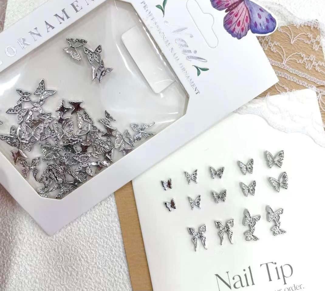 Set 30 charm bướm kim loại bạc, phụ kiện trang trí móng - tgn937