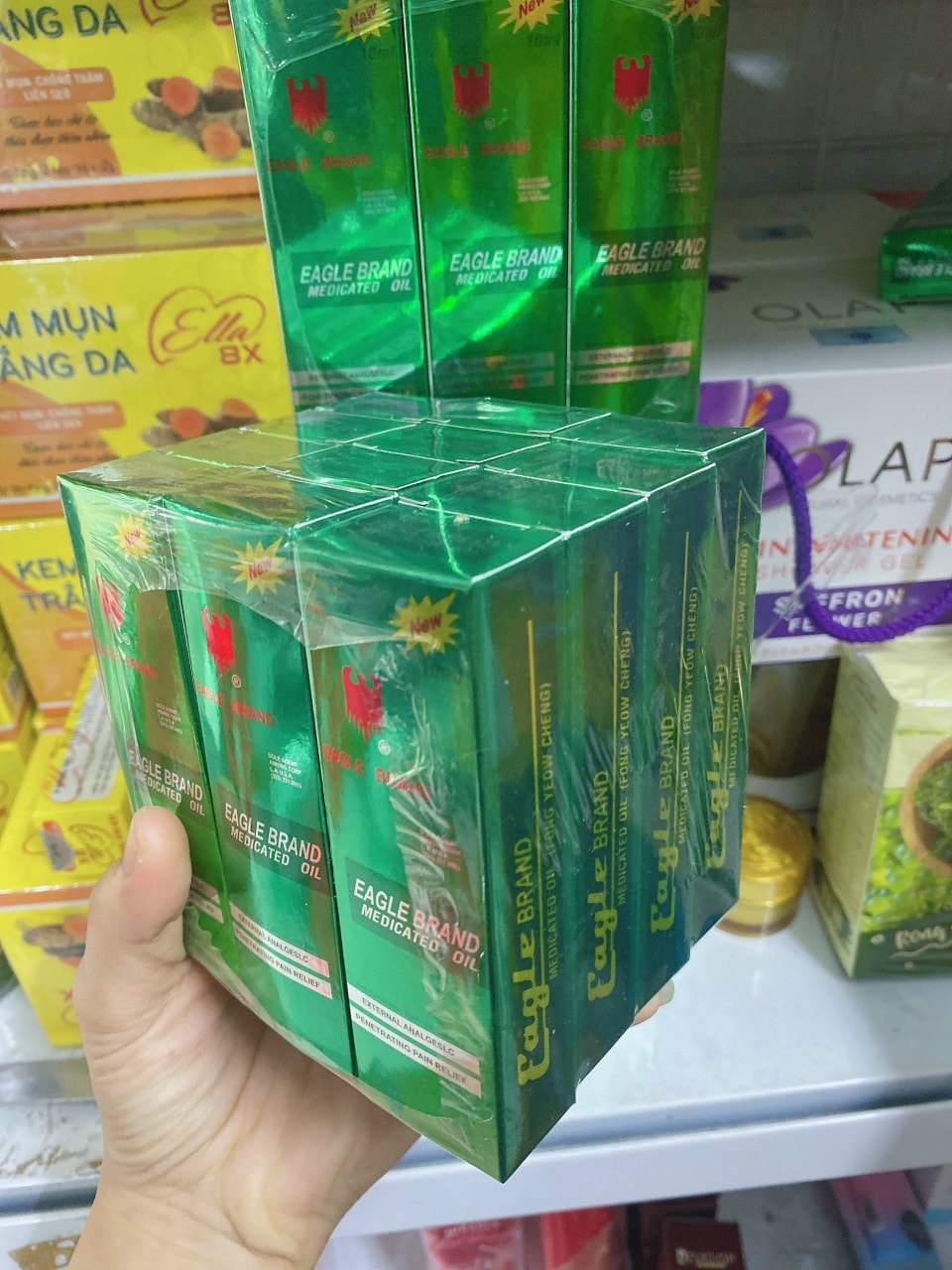 Dầu gió xanh con ó Singapore dạng lăn 10ml
