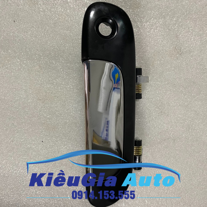 Tay mở cửa ngoài Ford Laser