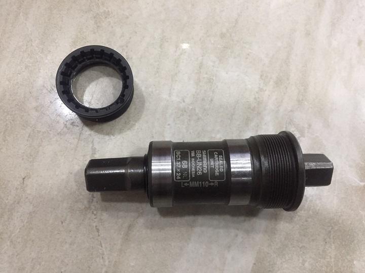 Trục giữa Shimano BB-UN26 cốt vuông- chính hãng Shimano (không kèm ốc)