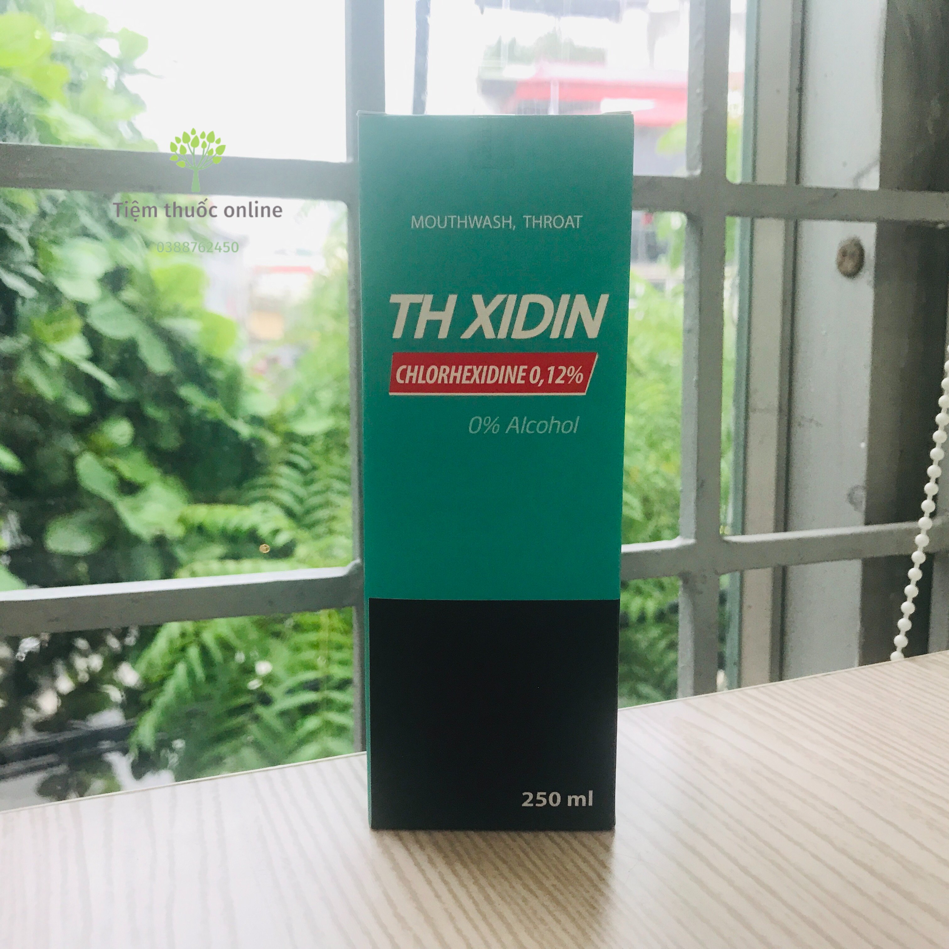 Nước súc miệng họng th xidin chai 250ml