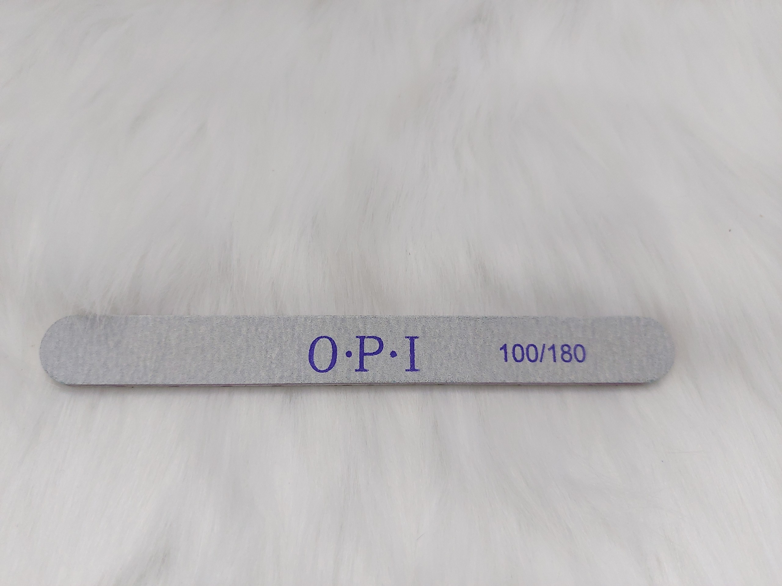 1 cây dũa 100/180 OPI
