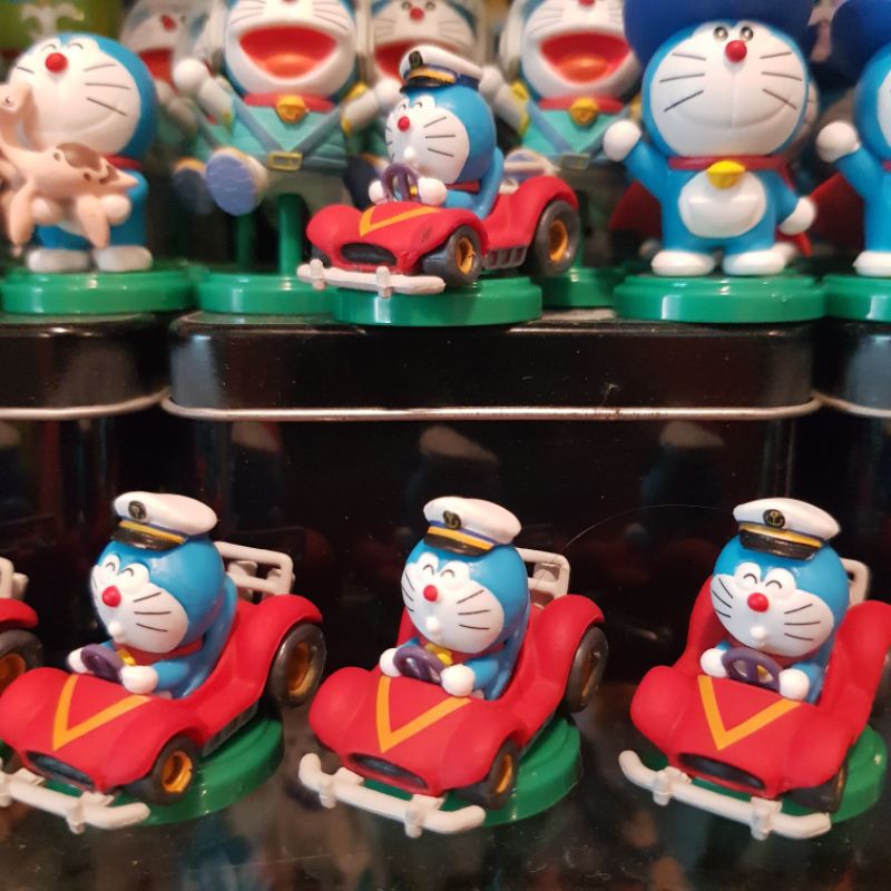 mô hình đế xanh mini nhật doraemon chạy xe