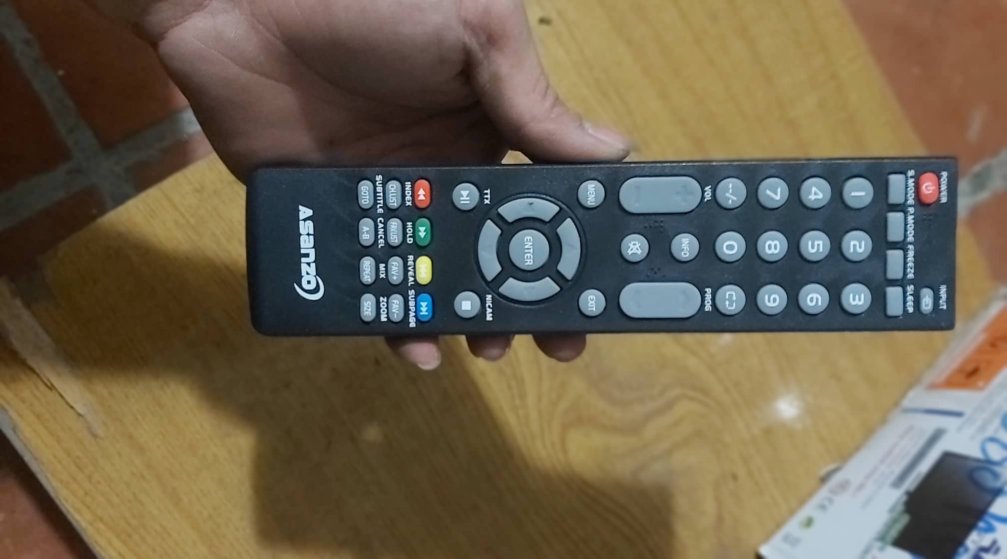 remote ti vi asanzo dày
