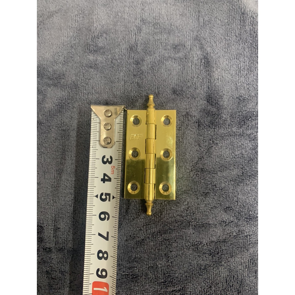 Bản lề đồng tủ quần áo.