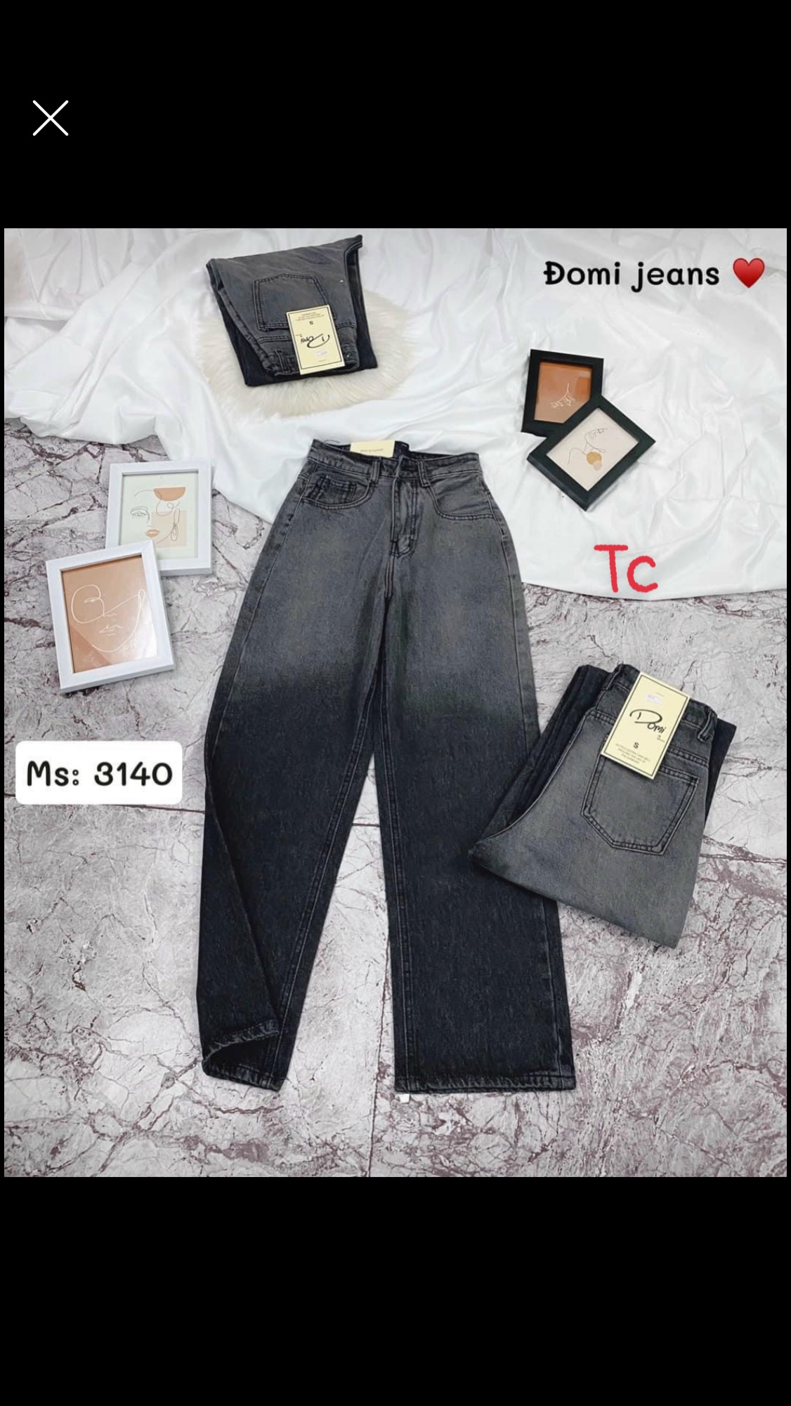 Quần bò ống rộng loang khói