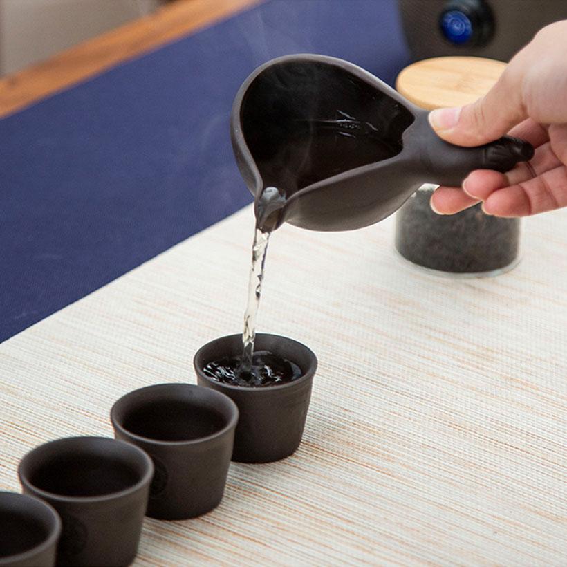 Bộ ấm trà gốm sứ tự động rót