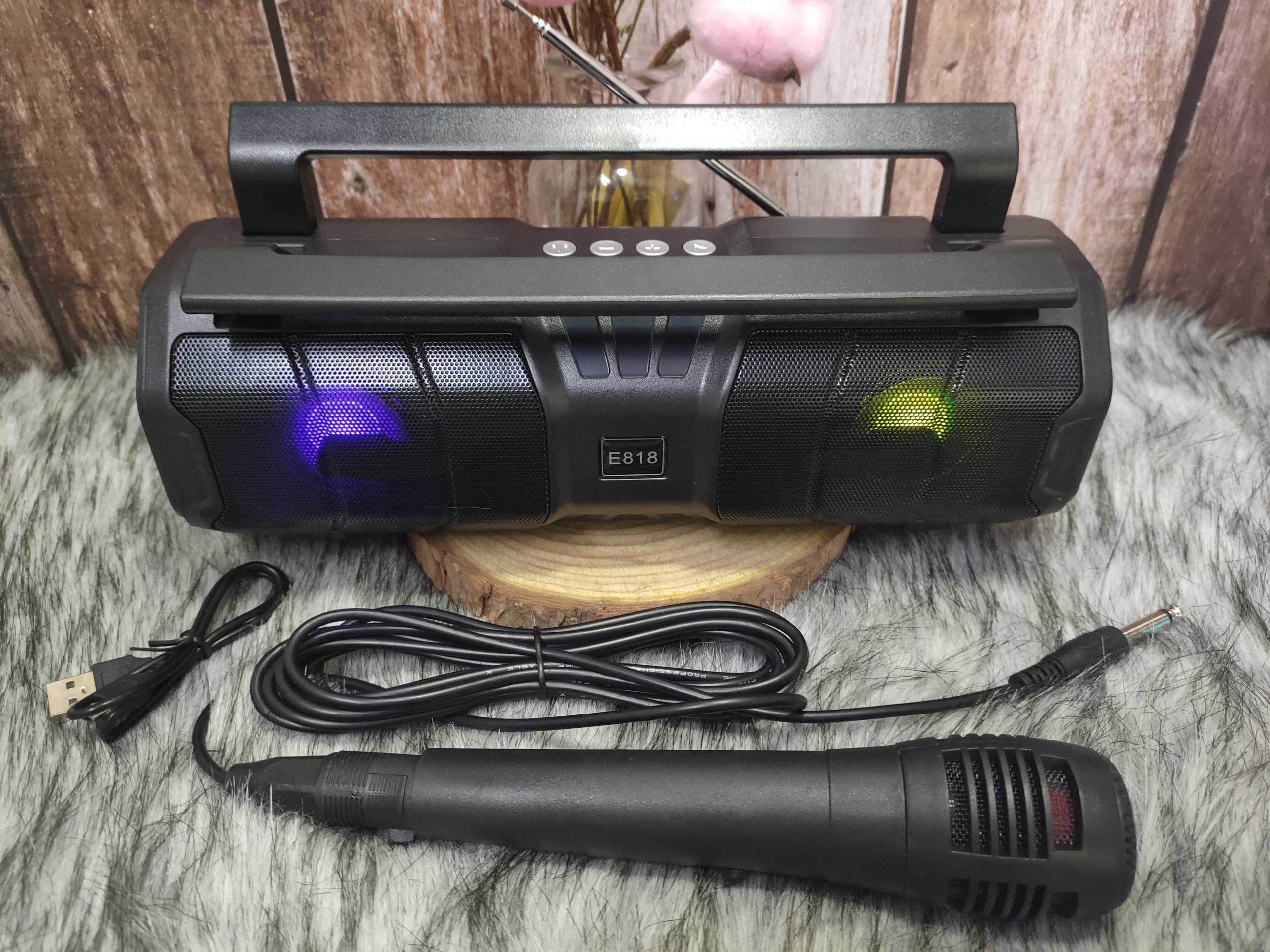 Km-s1 e818 Bluetooth karaoke speaker direct plug wired microphone karaoke speaker LED lamp strobe strong bass battery nice design 5D surround sound