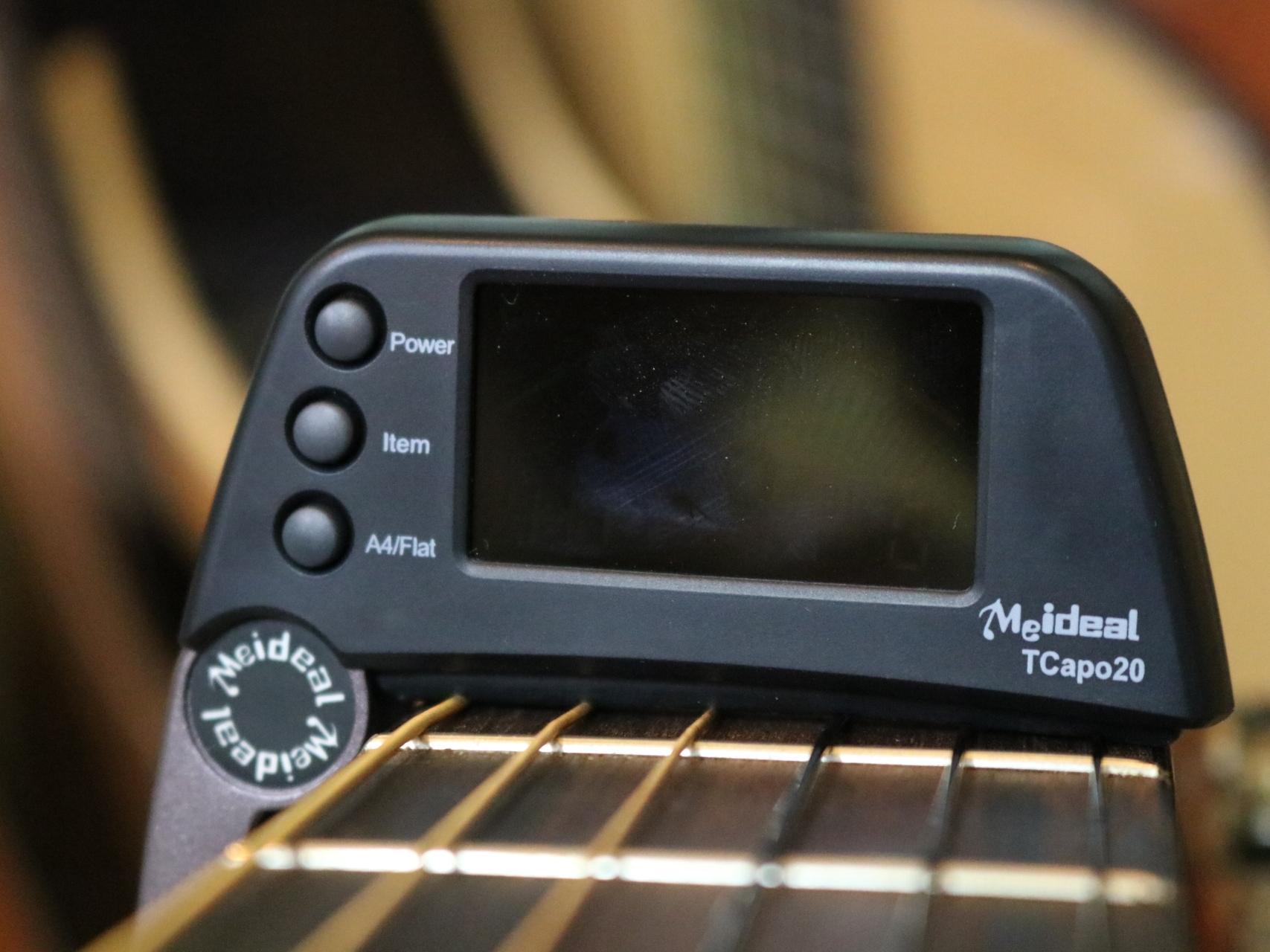 Capo Guitar có tích hợp Tuner lên dây đàn ( Capo Và Tuner Guitar )