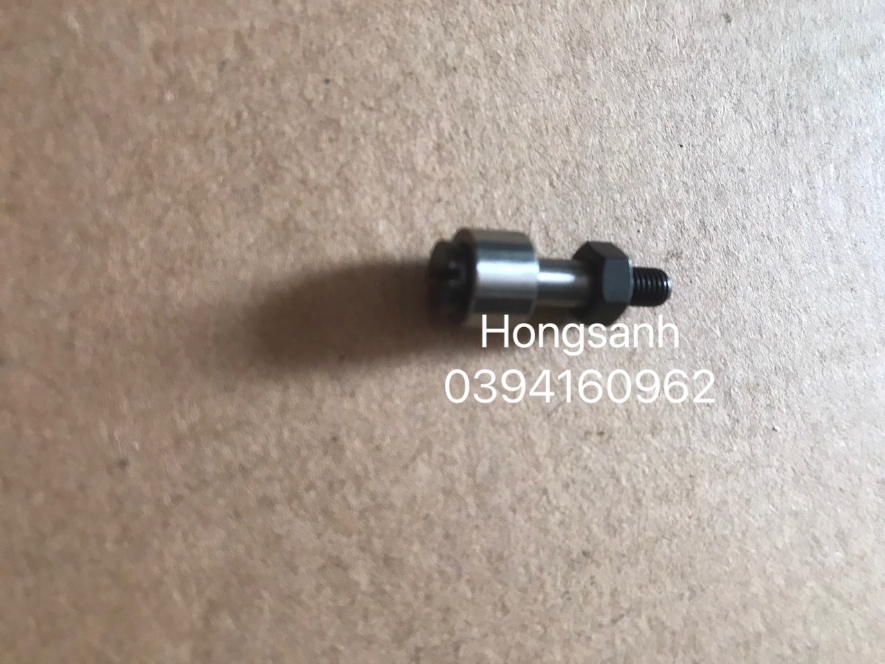 Bi cam máy may bao Newlong