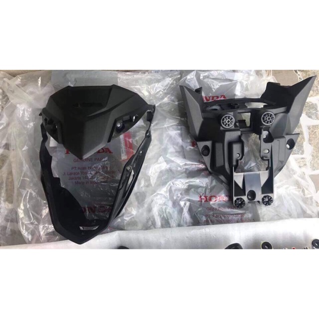 Bợ nhựa nhám chóa đèn pha Sonic 150R Zin indo