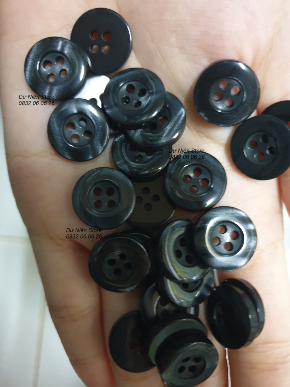 Black Glossy Trouser Buttons Pack of 50 Buttons.
