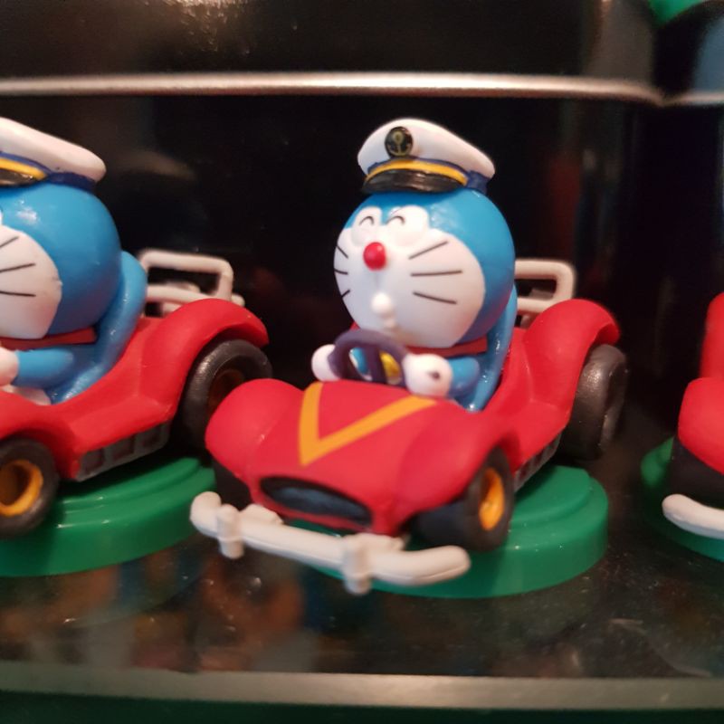 mô hình đế xanh mini nhật doraemon chạy xe