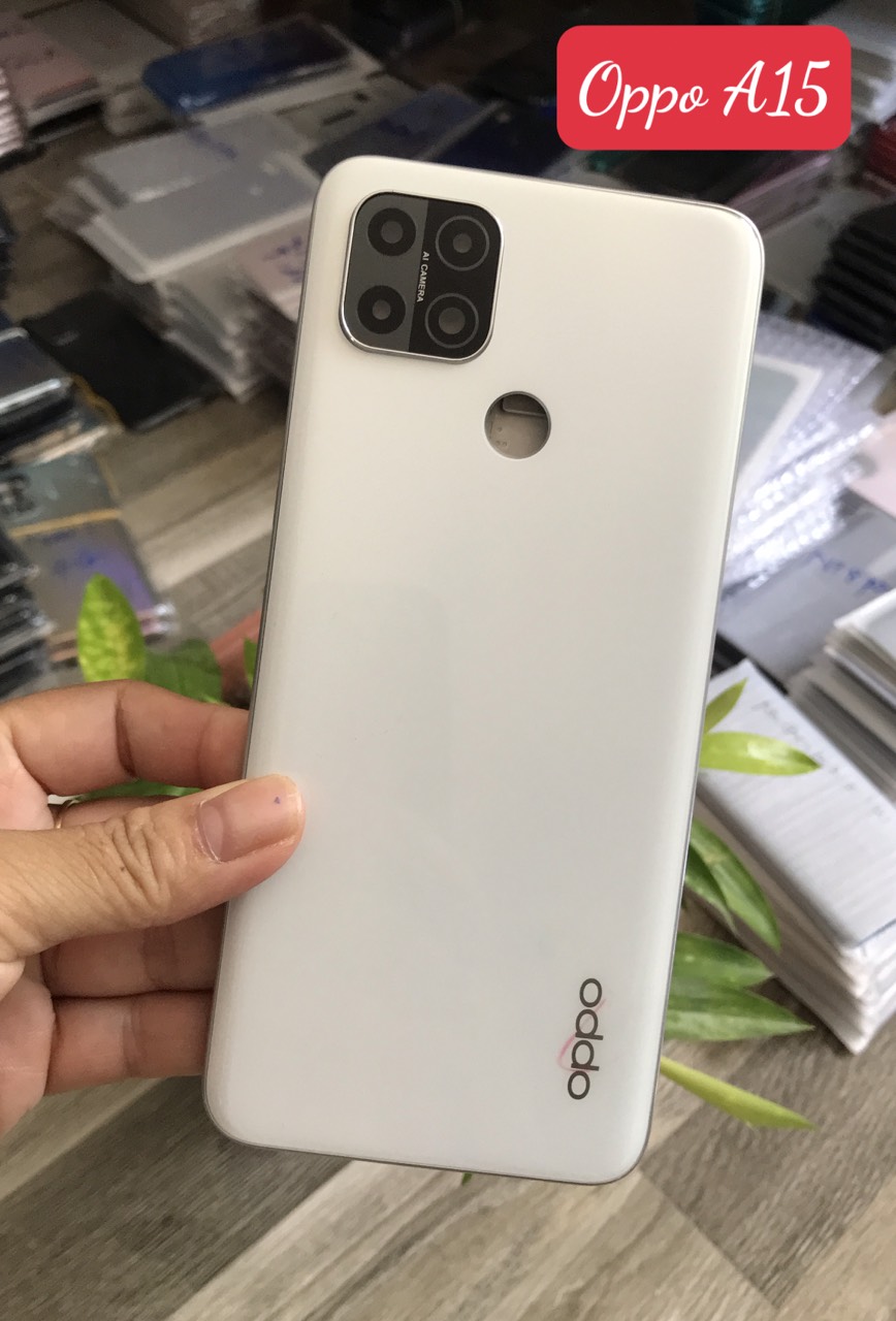 Bộ vỏ oppo A15 / A15s zin  (gồm lưng ,xương ,phím bấm,kính camera )