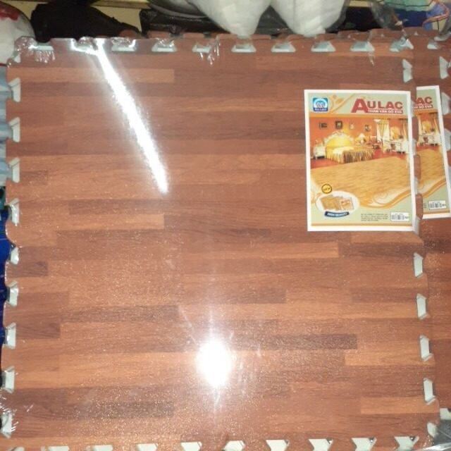 - thảm xốp ghép vân gỗ âu lạc kt. 60x60 cm.