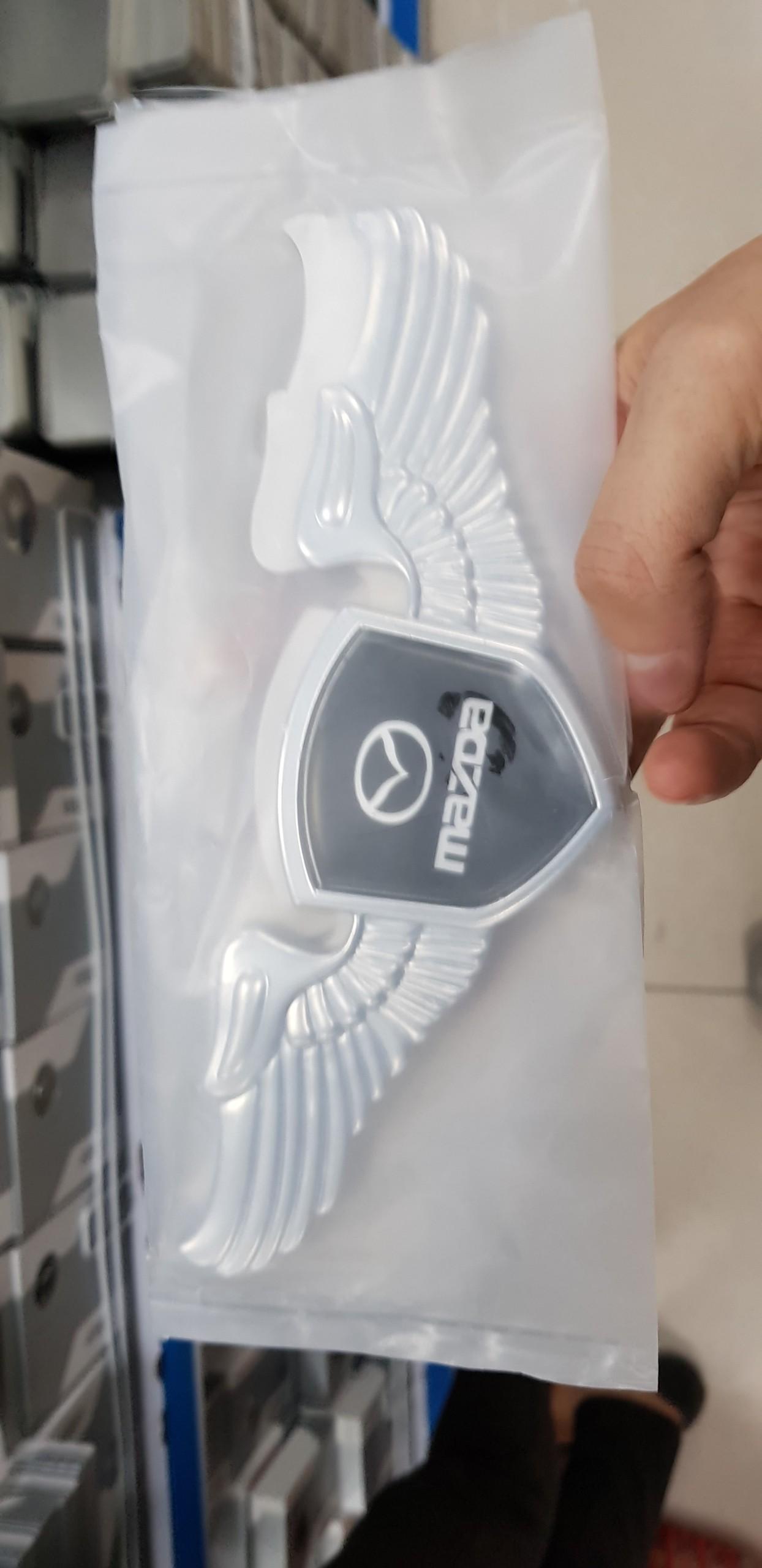 [Hỗ trợ lắp đặt khách Hà Nội] Biểu tượng cánh thiên thần Mazda màu bạc