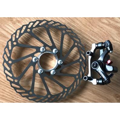 Bộ phanh đĩa lắp cho động cơ xe điện hoặc lắp vào xe đạp thể thao, gồm  1 đĩa phanh và 1 củ phanh, chế xe đạp điện