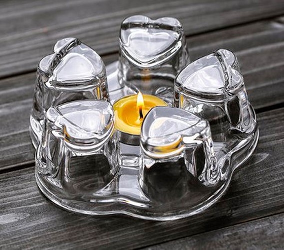 Đế đựng nến dùng giữ bình trà luôn luôn ấm