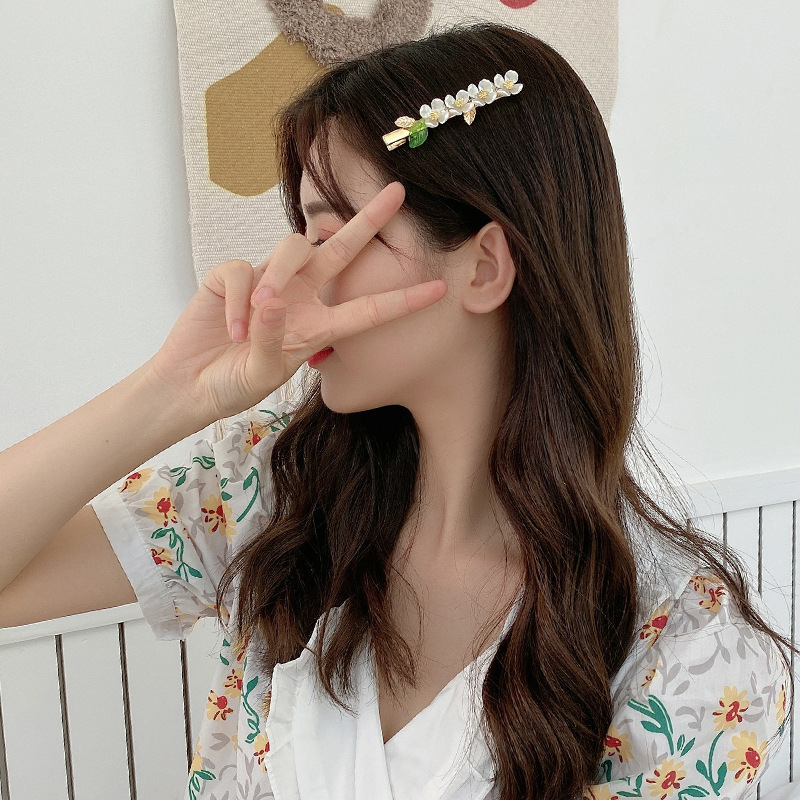 Kẹp tóc mái dễ thương hình cành hoa