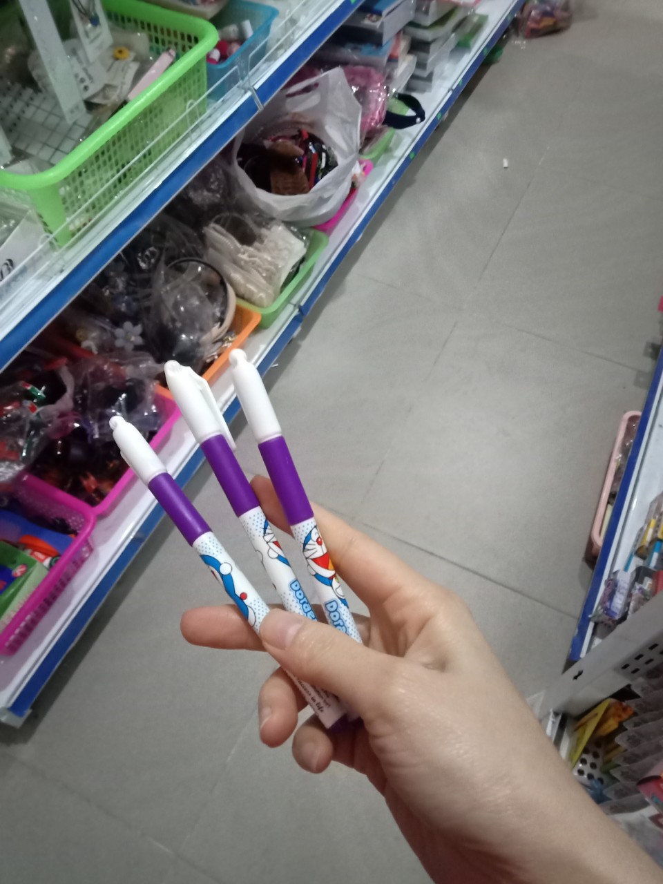 Bút gel nước Doremon mực tím ( 10 bút)