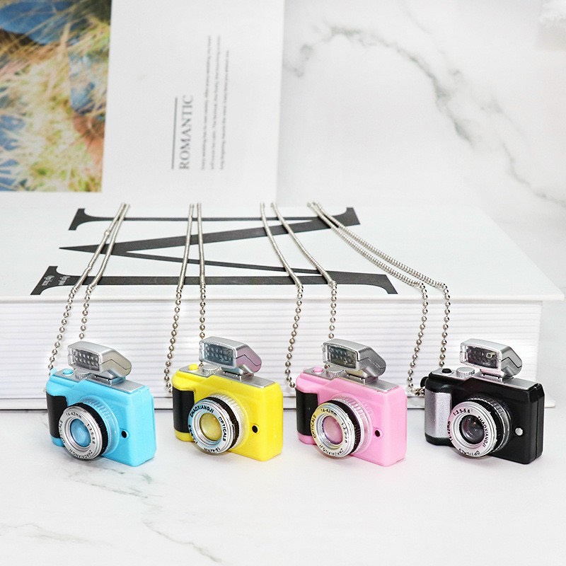 Dây chuyền mặt mô hình máy ảnh phát sáng MS156