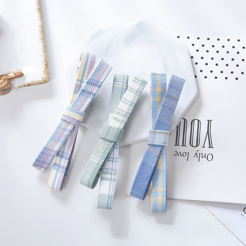 Kẹp tóc chữ X vải kaki được chọn mẫu