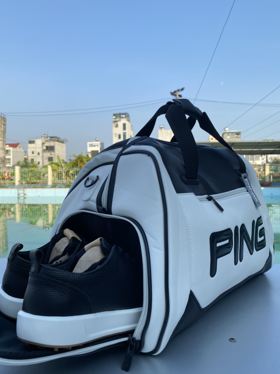 Túi Đựng Quấn Áo Golf Nam Nữ PING Chất Liệu Da Bò Hạt Sần Cao Cấp Kháng NướcTốt, Dễ Vệ Sinh, Có Ngăn Để Giày. túi gôn