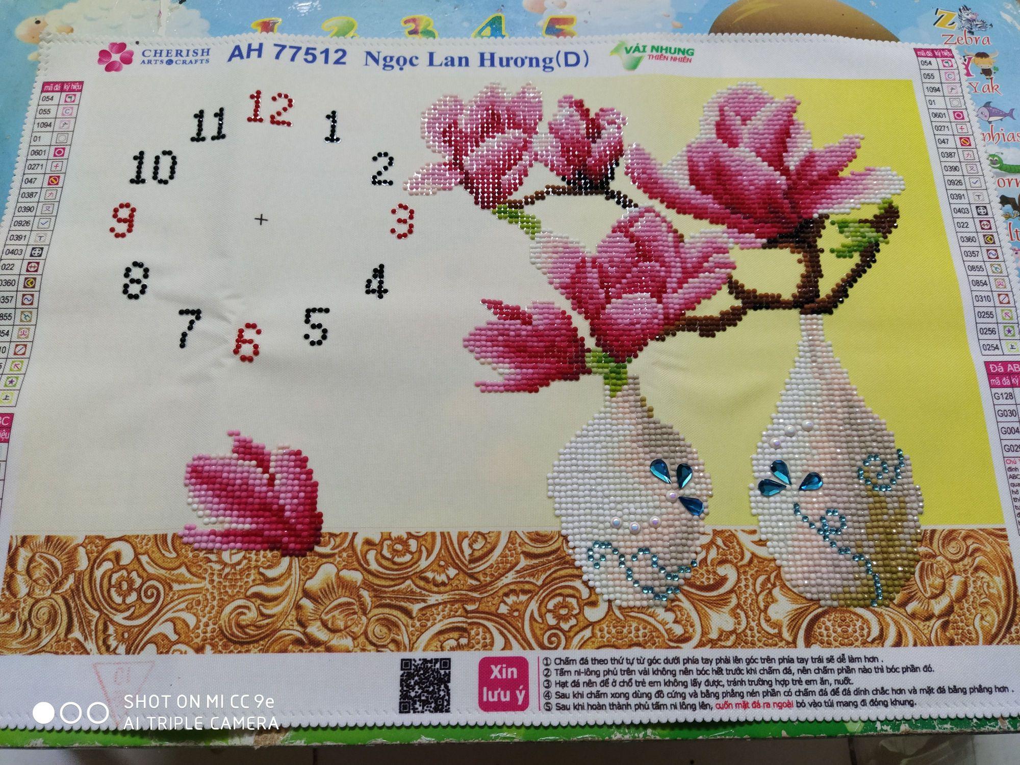 Tranh đính đá đồng hồ hoa lan 77512 kt 44x29cm chưa đính