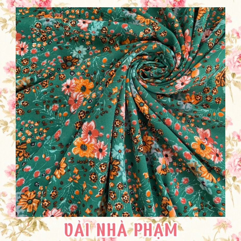 Vải voan cát hoa cam nền xanh lá - khổ vải 1.5m - vải nhà phạm