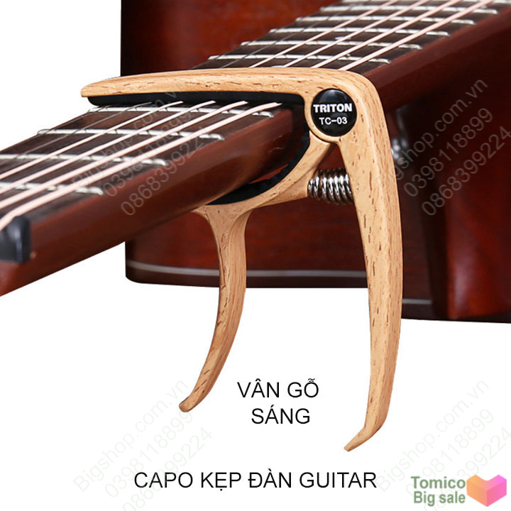 Capo Guitar dùng để tăng độ cao của âm, làm bằng hợp kim chắc chắn