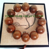 Vòng đeo tay phong thủy gỗ Muồng vân thớ ngang hạt 20mm