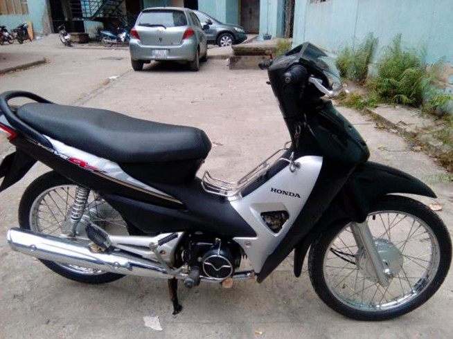 Cánh yếm trái WAVE Alpha năm 2009 Màu Đen (64770KWYA00ZA)