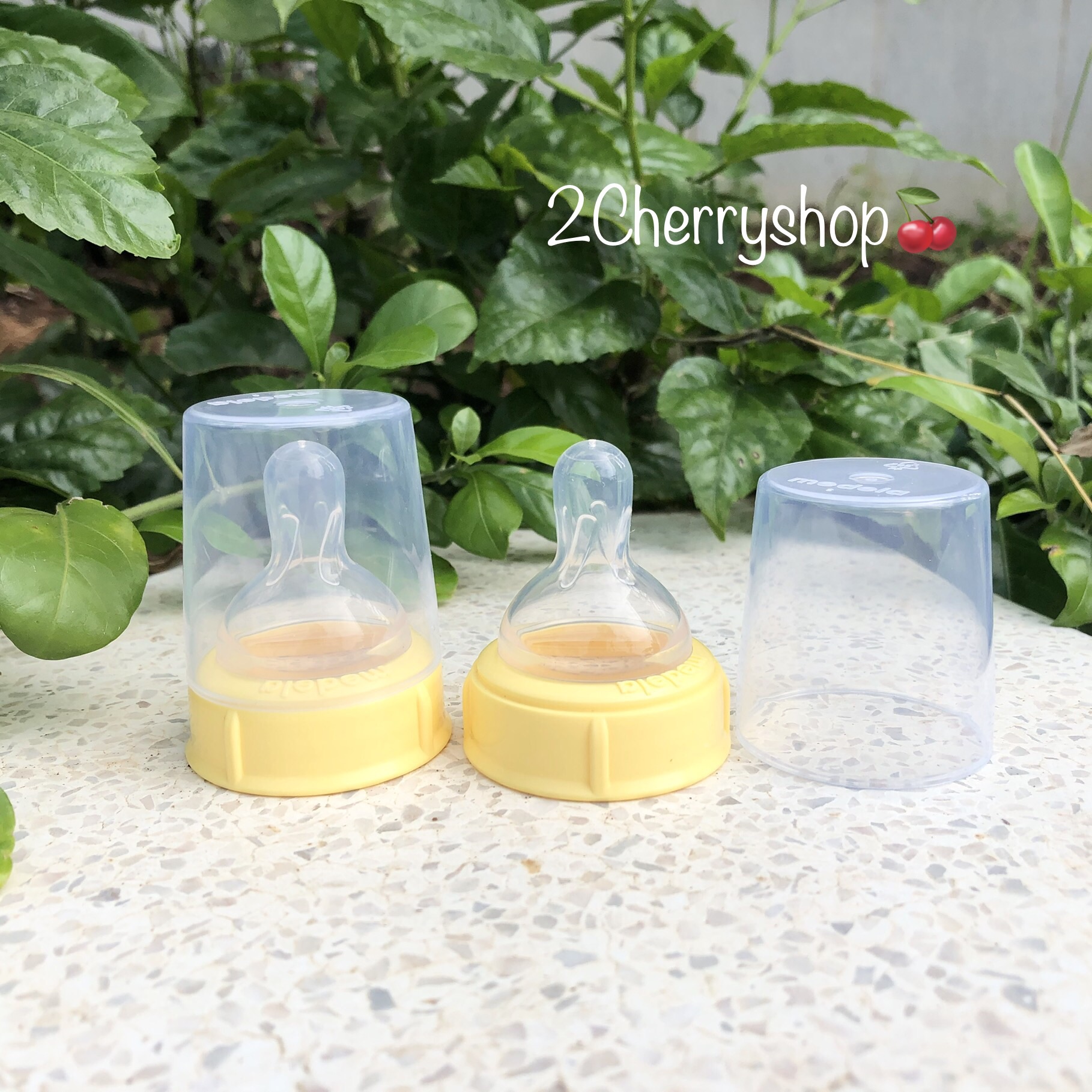 Bộ Núm ty cổ vòng + nắp Medela