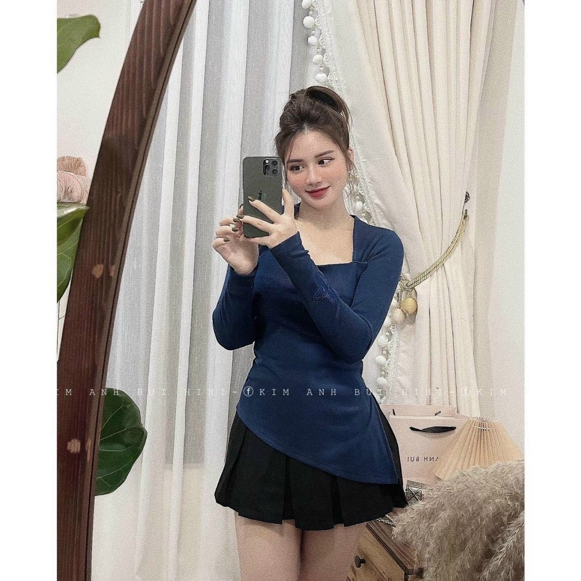Áo thun nữ tay dài, kiểu xẻ tà, chất thun gân