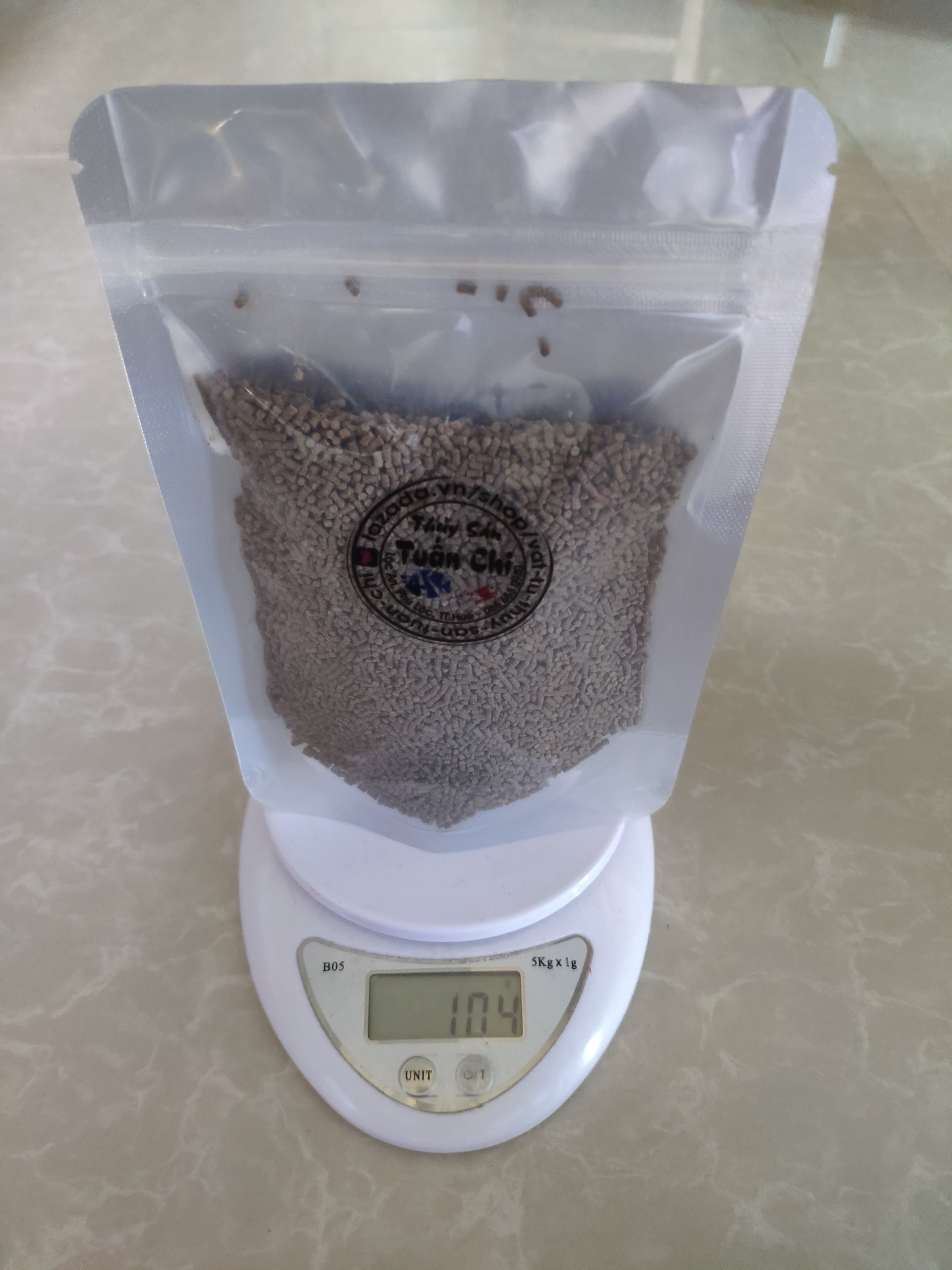 Bịch 100g thức ăn cho tôm, tép, cá cảnh... (hạt cỡ nhỡ 3/10)