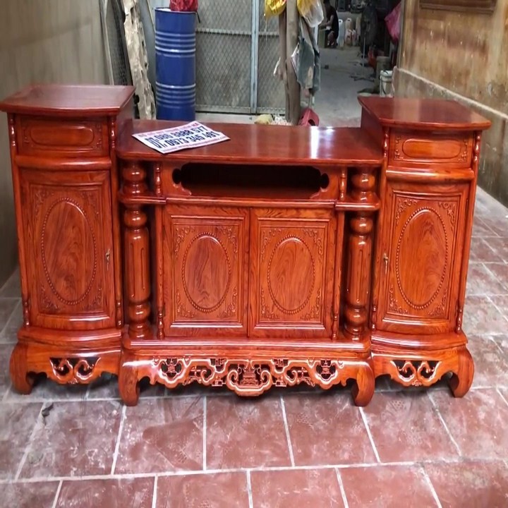 Kệ tivi cột nho gỗ gụ
