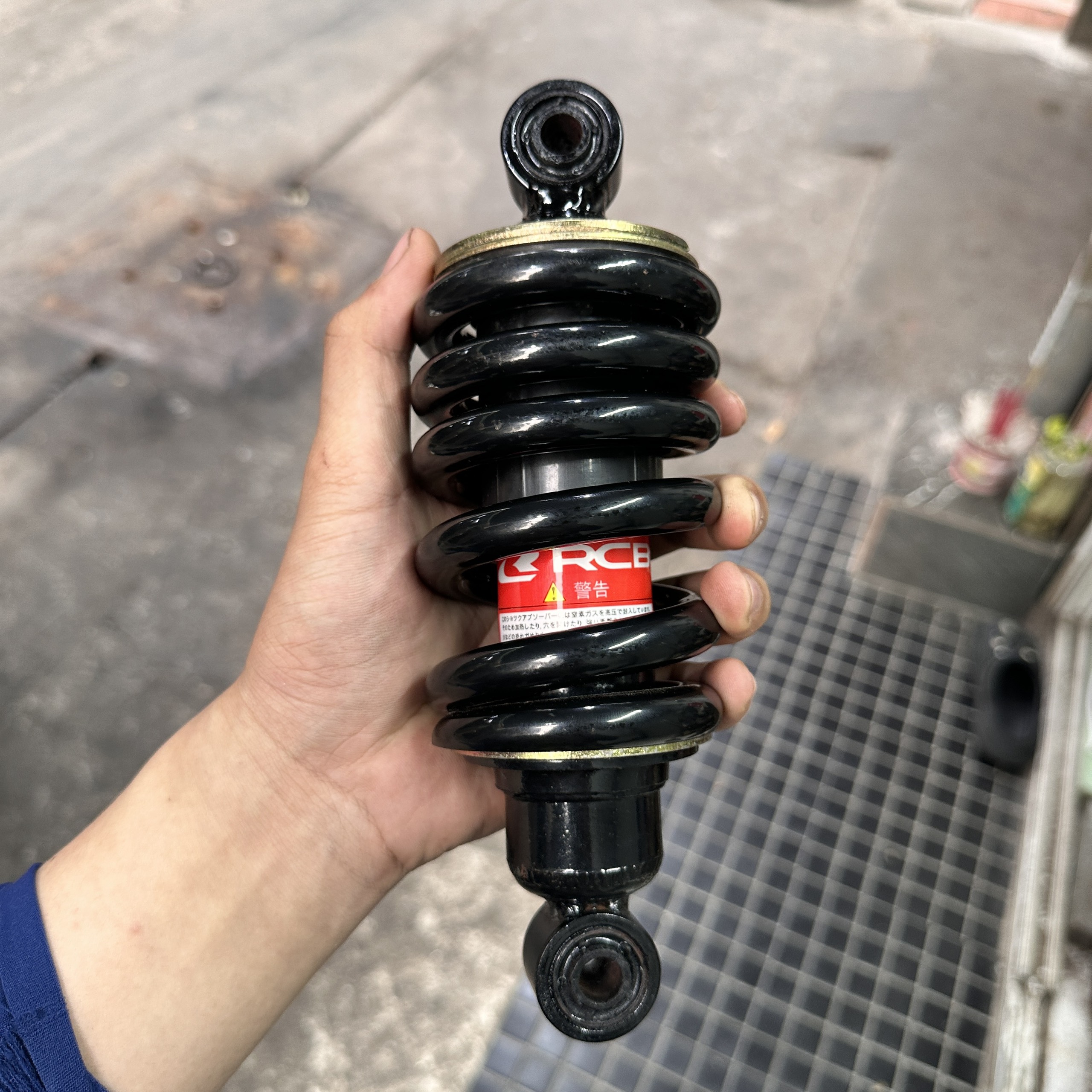 Phuộc nhún sau Ex 135 Ex 150 Ex 155