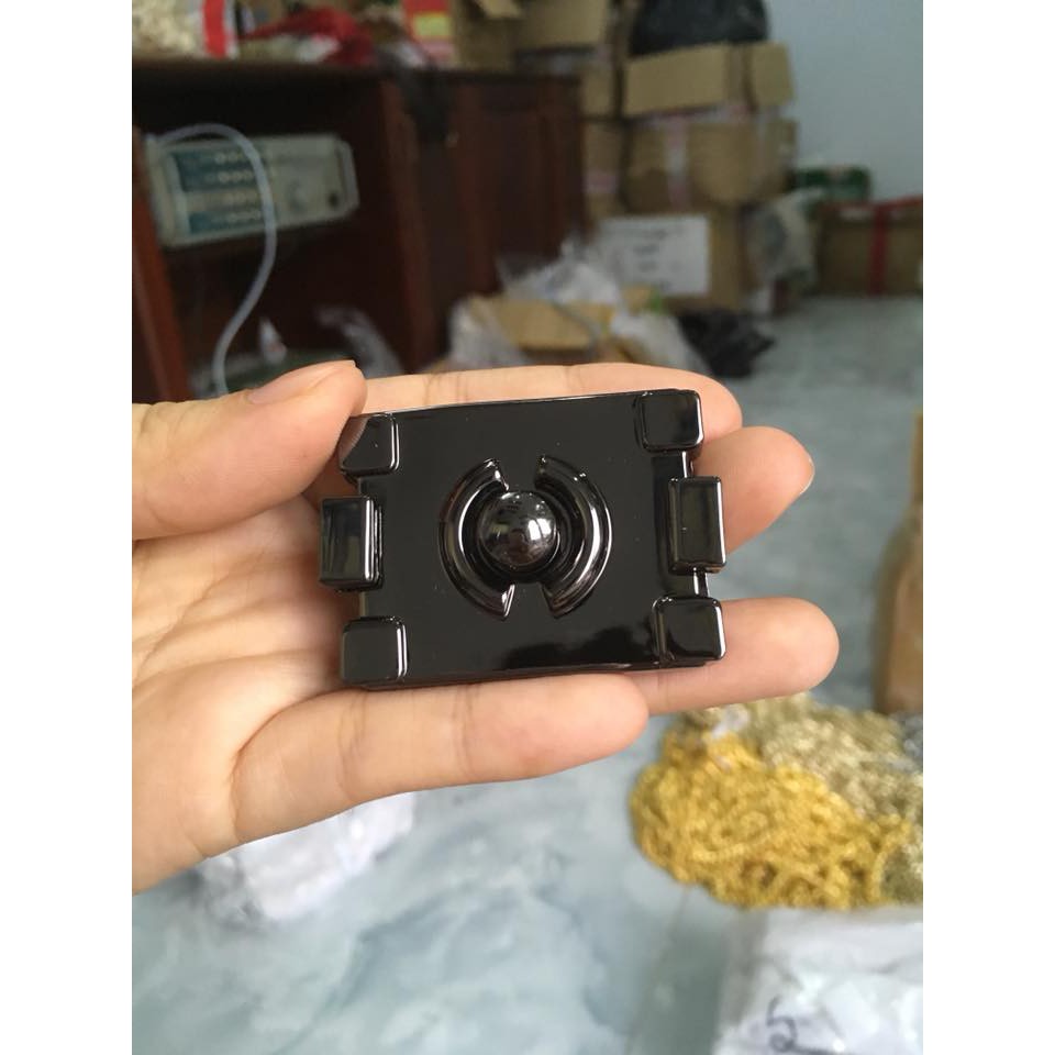 Khoá túi xách boy bấm
