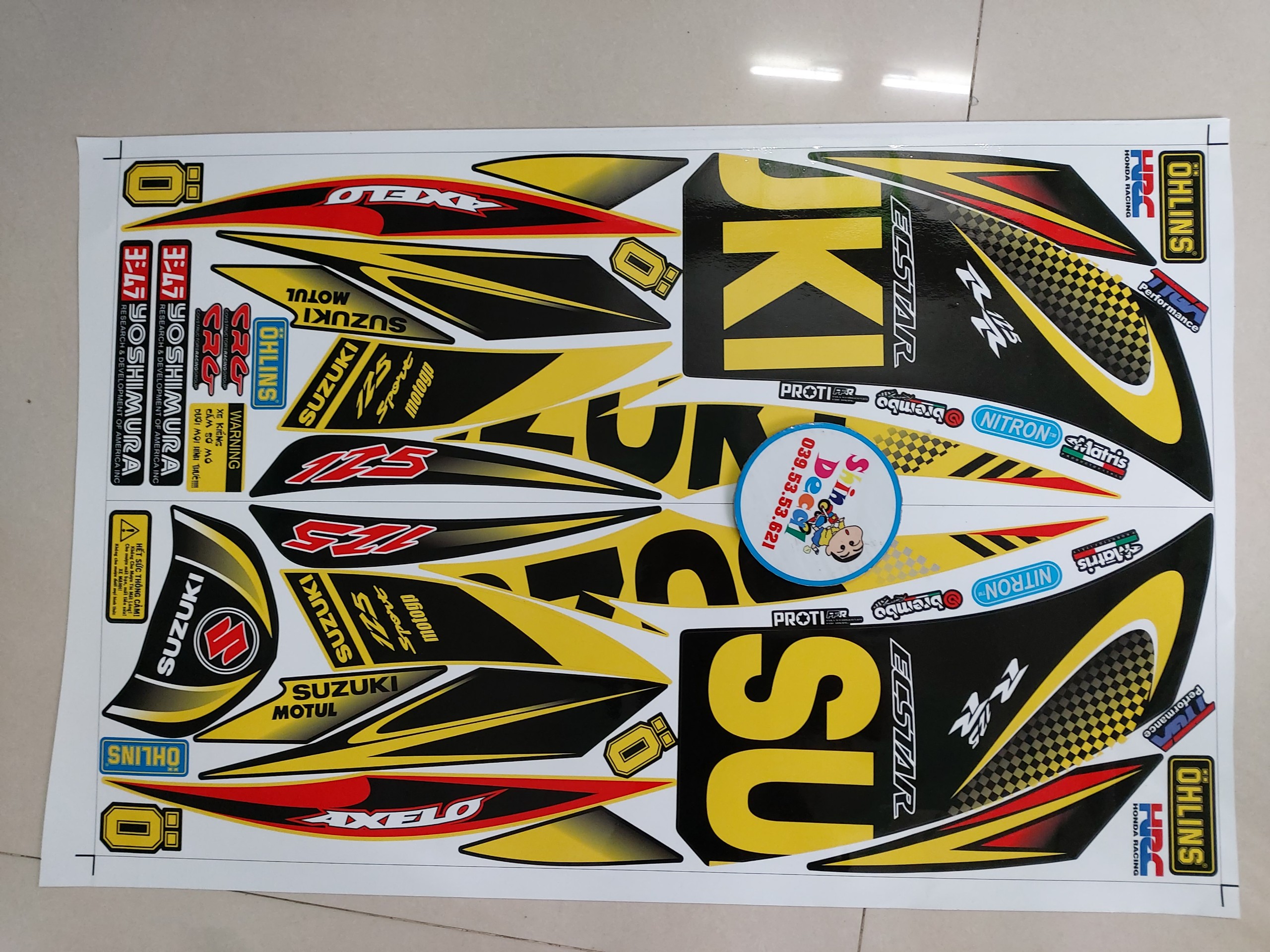 Tem axelo suzuki 125 móc câu vàng đen