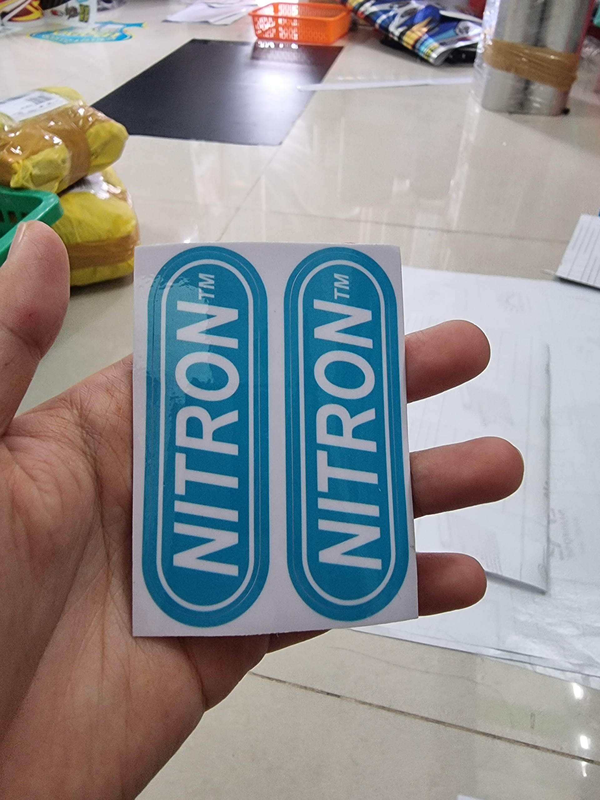 Logo nitron trắng xanh bán 1 cặp như hình