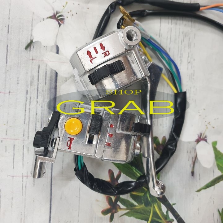 Bộ cùm công tắc xe CUB 82 (2 bên) - không đề