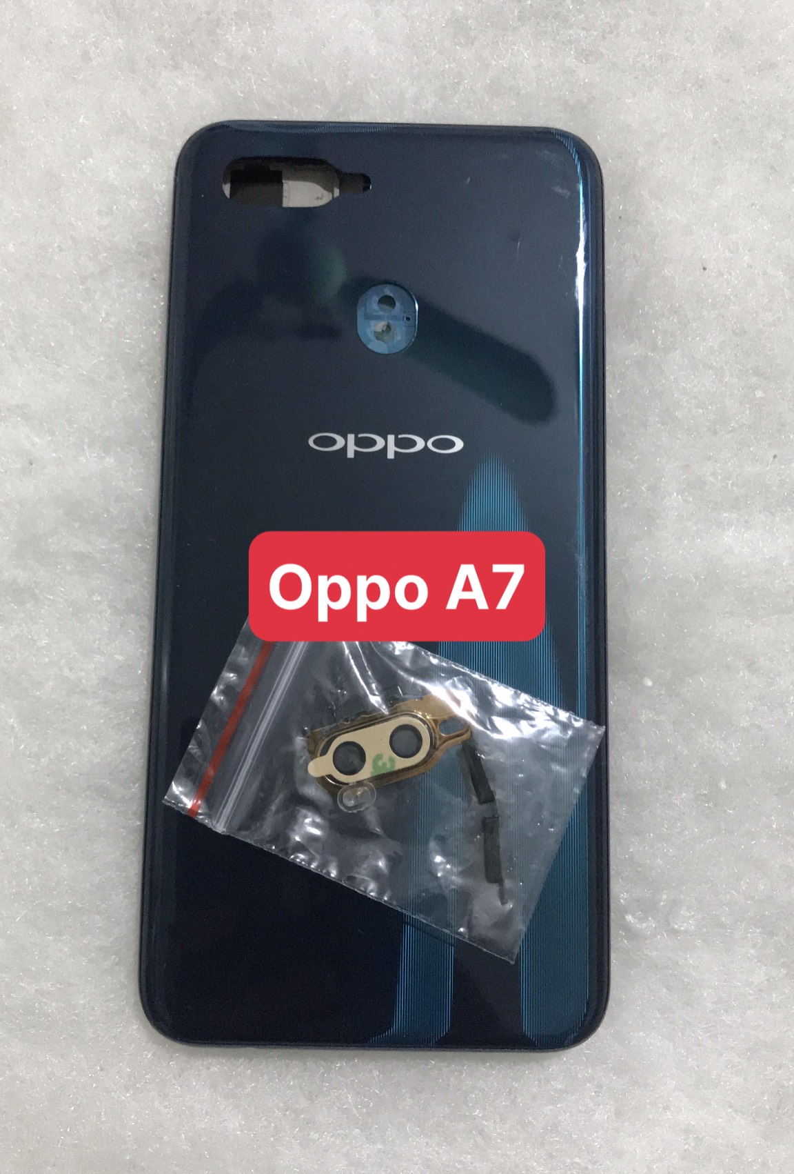 Bộ vỏ sườn oppo A7 zin new - bộ gồm lưng, sườn .phím bấm. kính camera