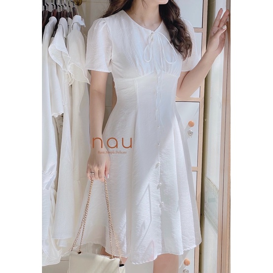 Đầm phối nút ngọc dáng xoè nhẹ cột nơ cổ