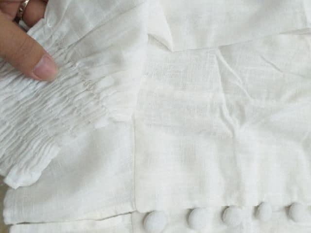 Áo nút bọc peplum