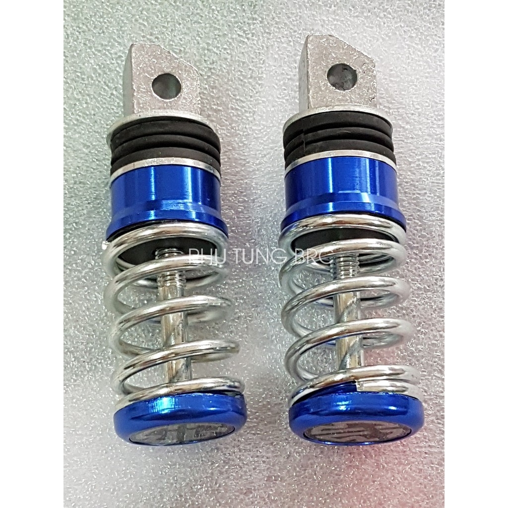 Gác chân sau lò xo xe máy ( 1 đôi, tặng 2 con ốc kiểu để lắp).