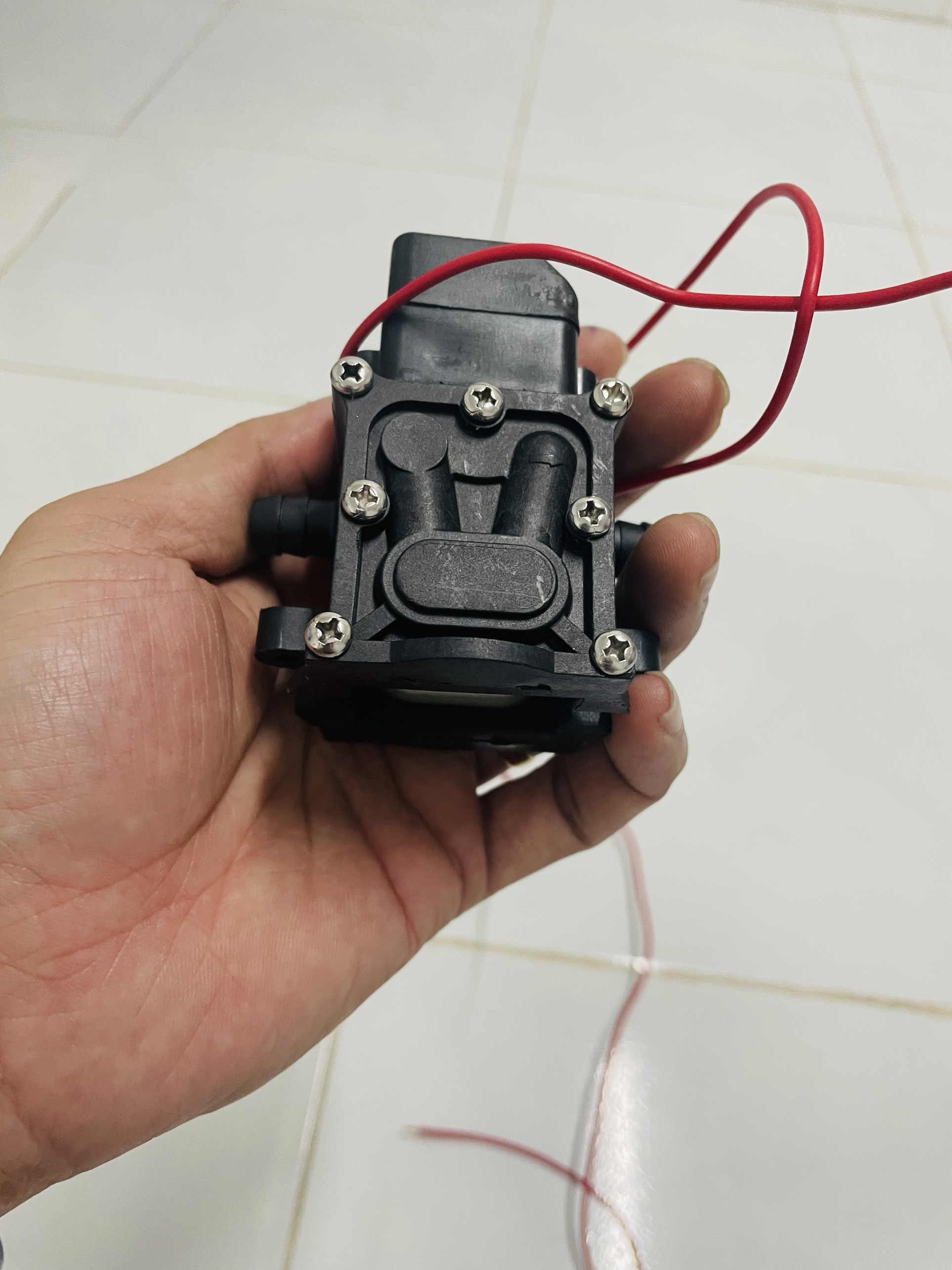 Đầu bơm dùng cho máy bơm mini rửa xe, phun sương